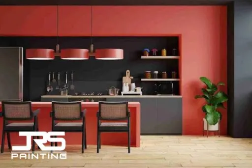 What Type of Paint Is Best for Cabinets in Phoenix Homes? Modern red and charcoal kitchen cabinetry showcases the best paint for cabinets with a smooth, durable finish.