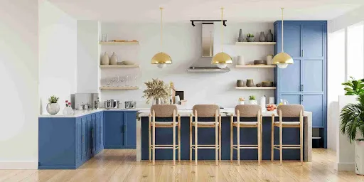 What Type of Paint Is Best for Cabinets in Phoenix Homes? Navy blue kitchen cabinets with brass lighting demonstrate the best paint for cabinets in a modern open layout.