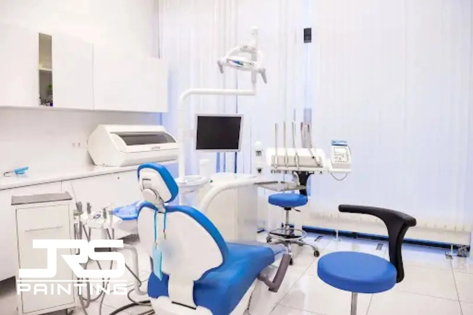 Repainting a Dental Office Without Disrupting Patient Schedules Dental office repainting in a modern treatment room with clean white walls, dental chair, and professional equipment.