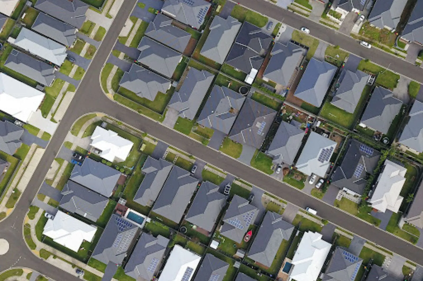 What to Do When Your HOA Sends a Paint Violation Notice HOA paint violation notice aerial view of homes with strict exterior color consistency standards